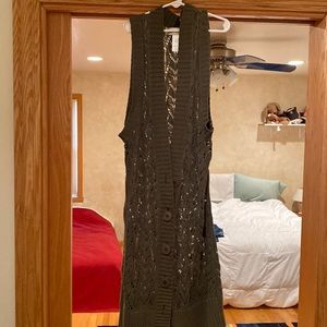 Olive green knit vest with large buttons